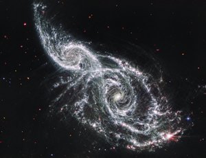 Galaxies IC 2163 and NGC 2207 (MIRI Image) by James Webb Space Telescope (NASA)